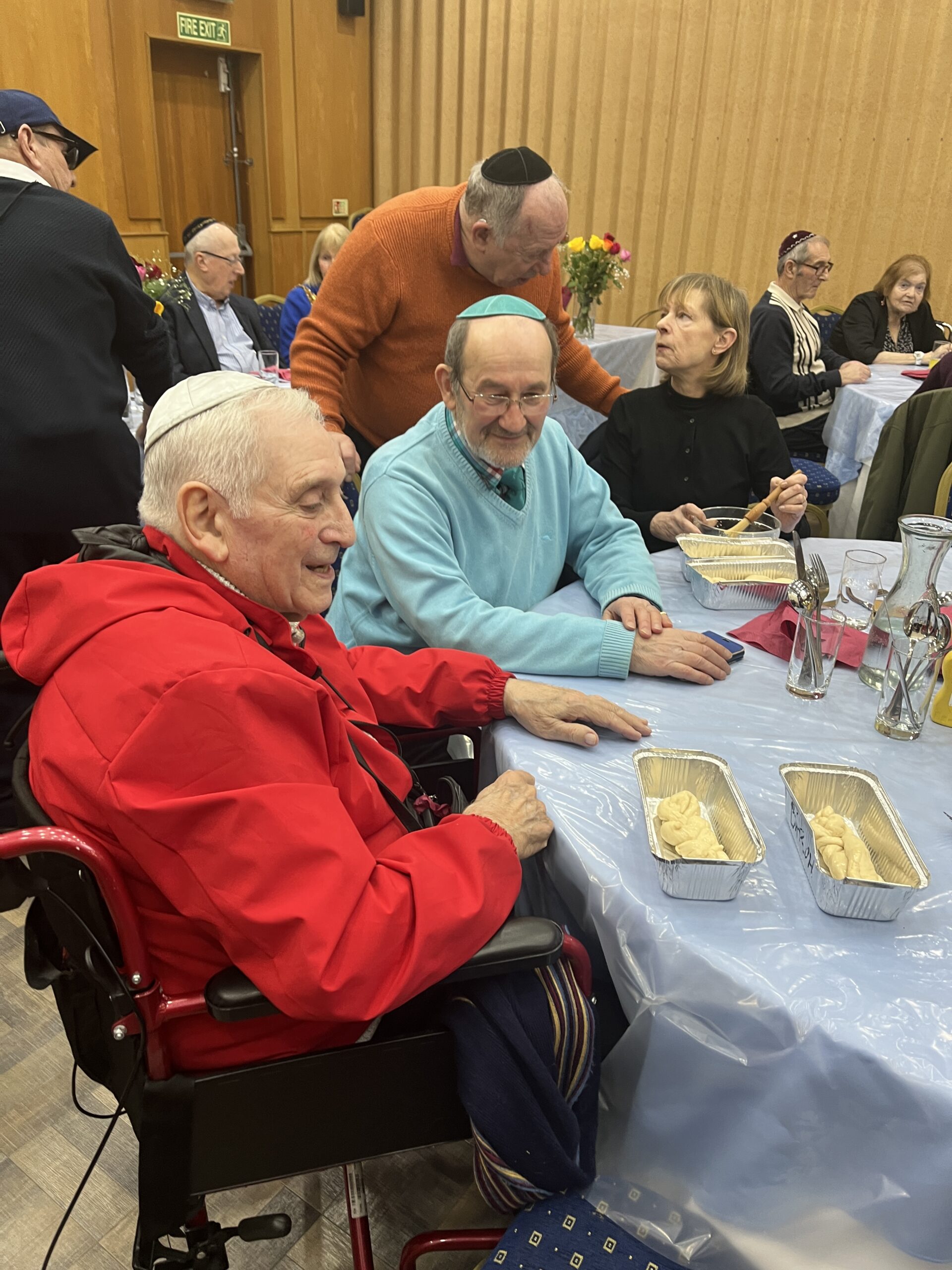 People enjoying time together at Solihull Shul